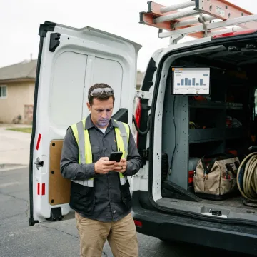 Technician tracking job time on a mobile device