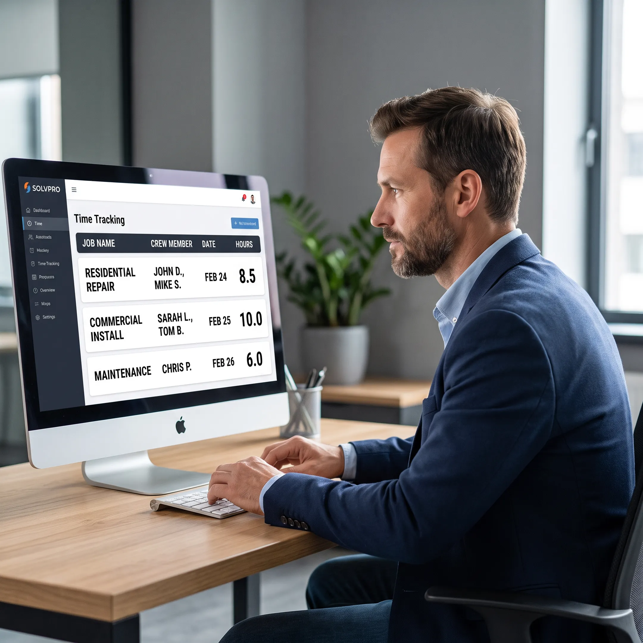 Service manager reviewing crew time and job labor records on a Mac