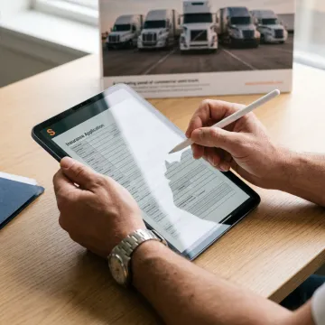 Completing an online ACORD application for motor truck cargo insurance.