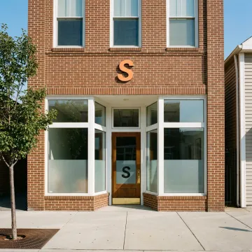 A modern commercial building in Augusta, GA, representing business property insurance.