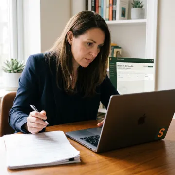 Insurance advisor reviewing technology E&O coverage