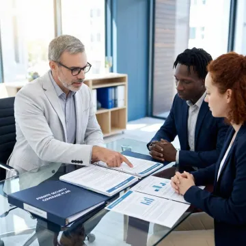 Insurance broker presenting customized security company coverage plan