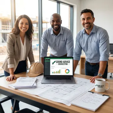 Construction bookkeeping team reviewing financial reports