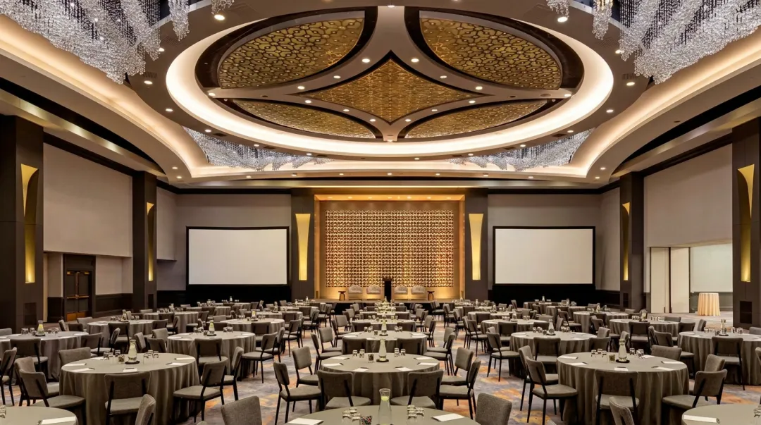 Large convention hotel grand ballroom with modern lighting and flexible event setup