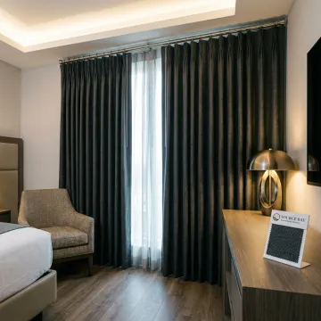 Custom hotel curtain track and drapery hardware