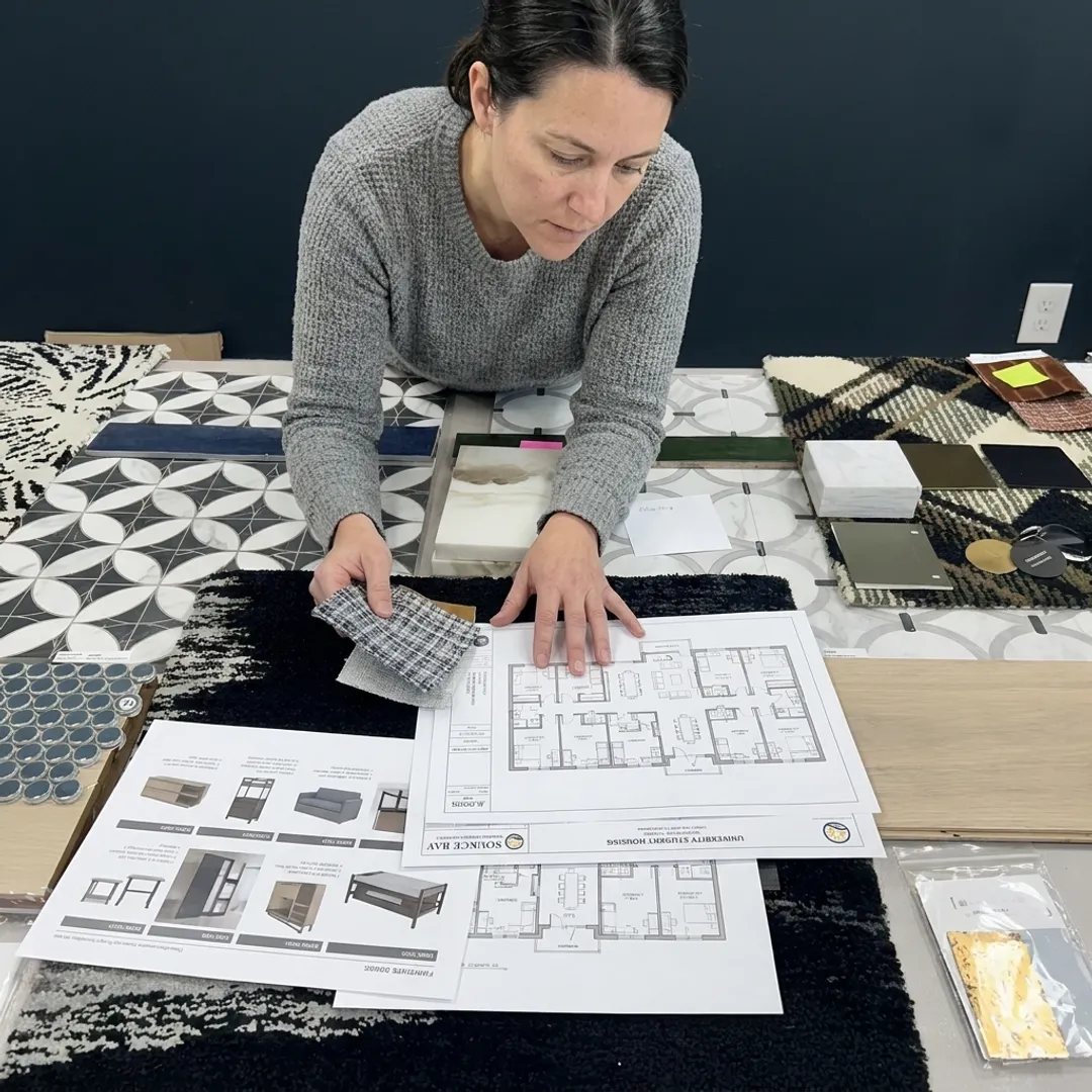 Designer reviewing student housing furniture samples