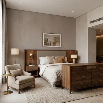 Upscale hotel guest room with coordinated furniture