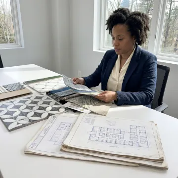 Designer reviewing healthcare textile samples