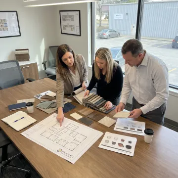 Commercial seating procurement team reviewing fabric samples
