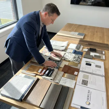 FF&E specialist reviewing commercial furniture samples
