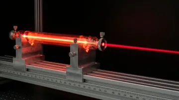 Helium-neon laser emitting red beam used in optical alignment laboratory