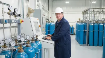 Specialty gas production facility with high-purity cylinder filling and manufacturing equipment