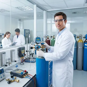 Lab technician preparing specialty gas cylinders