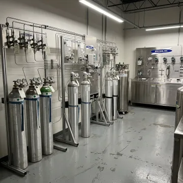 Specialty gas cylinders in a precision blending facility