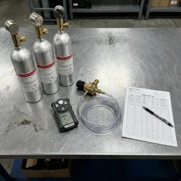 Calibration gas cylinders for confined space gas detectors