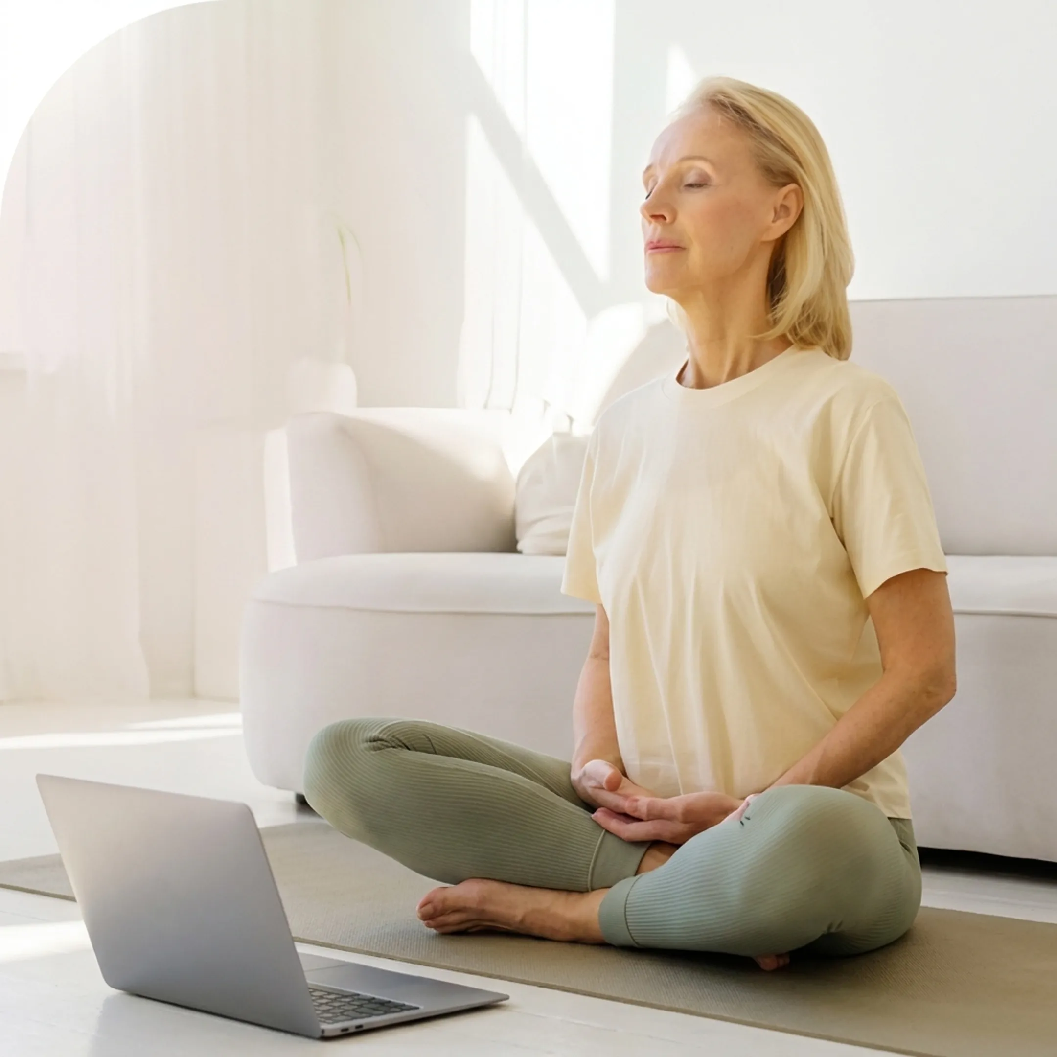 Online breathwork class on a laptop
