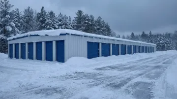 Minnesota winter storage facility exterior covered in snow and ice