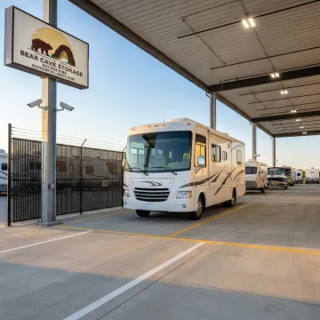 RV parked in secure storage facility with modern security features