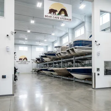 Various boats stored safely in a secure storage facility