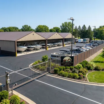 Secure boat storage facility with covered and outdoor spaces in Oronoco area