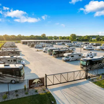 Secure RV storage facility with motorhomes and travel trailers in Hayfield Minnesota area
