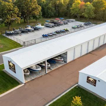 Secure boat storage facility with covered and outdoor spaces