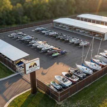 Boats safely stored in secure facility with protective covering