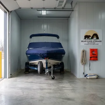 Boat stored inside a clean enclosed storage unit
