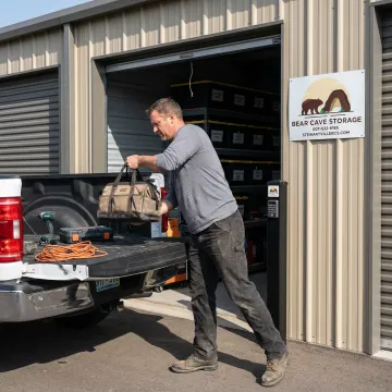 Contractor storage units with work trucks and equipment