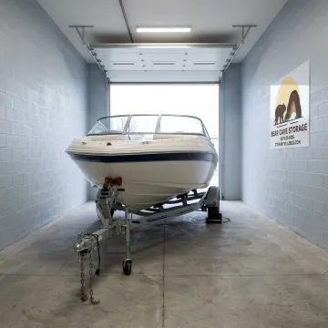 Boat stored safely inside enclosed storage