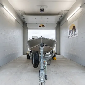Boat parked inside enclosed storage unit