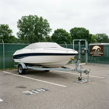 Boat stored securely at a gated storage facility
