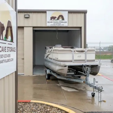 Indoor boat storage unit with drive-up access