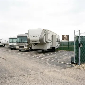 Secure RV storage spaces for fifth-wheel trailers