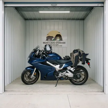 Motorcycle in enclosed storage unit