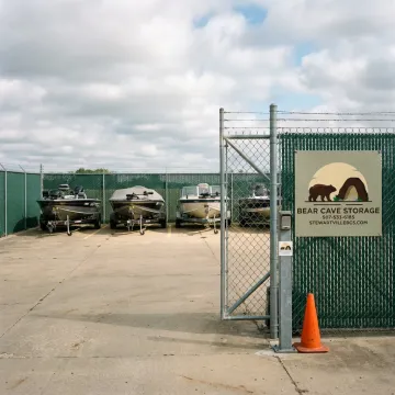Outdoor boat storage lot with secured trailered boats