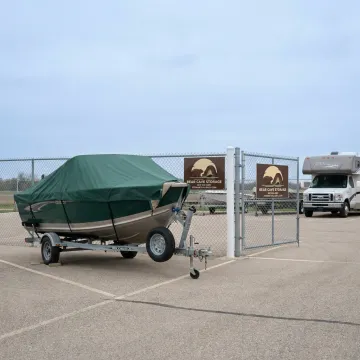Boat and trailer in secure outdoor storage