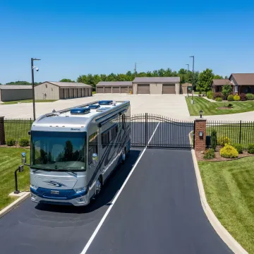 Large motorhome stored safely in gated storage facility