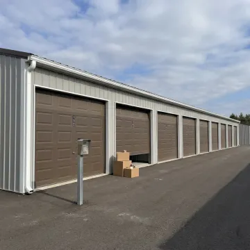Secure drive-up storage units with online rental access