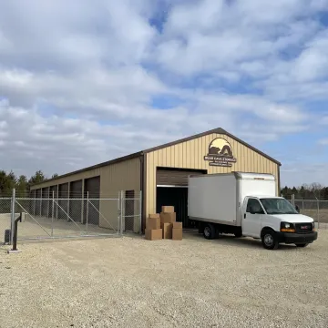 Drive-up self storage units with moving truck