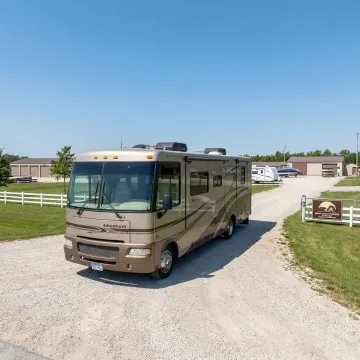 RV stored securely at a fenced storage facility