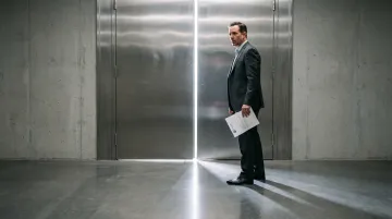 Conceptual illustration of a business owner facing a closing bank vault door