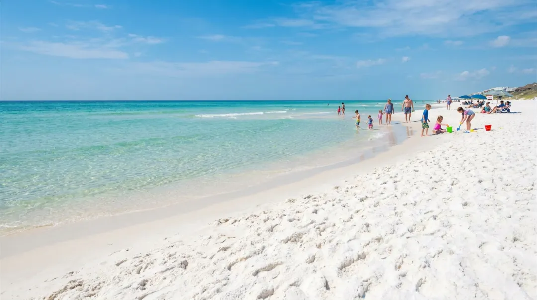 Emerald Coast Florida white quartz sand beach with calm turquoise Gulf water