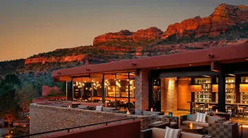 Upscale Sedona restaurant dining terrace with sweeping red rock canyon views
