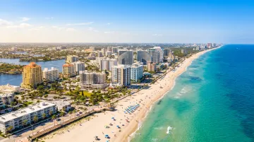 Fort Lauderdale beach aerial view showing Atlantic shoreline boardwalk and beach activity