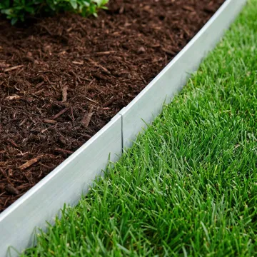 Durable aluminum landscape edging installed along curved garden bed