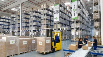 Take 2 Direct warehouse facility stocked with corrugated shipping boxes and packaging supplies