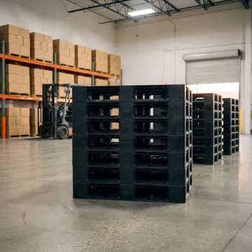 Custom plastic pallets stacked in a warehouse