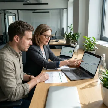 Startup founder reviewing CFO financial forecasts