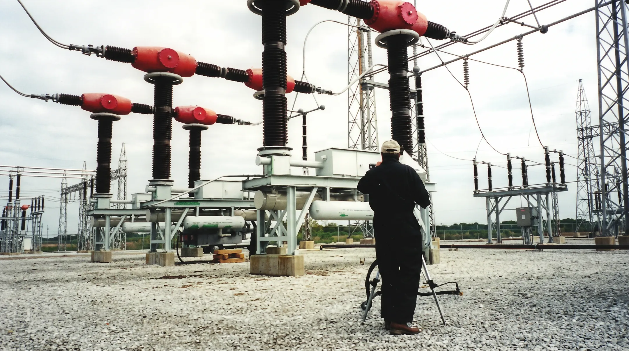 Substation technicians documenting transformer and SF6 equipment leak repair